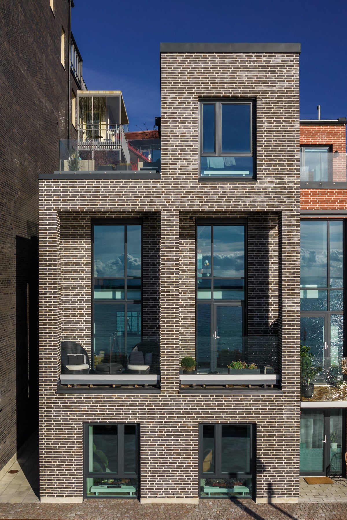 Maison de ville à Helsingborg : mur habillé de panneaux acoustiques en bois Cambois, vue 5